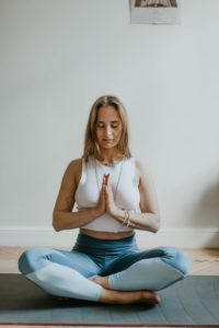 woman-doing-yoga-inside-a-room-3094215 (1)